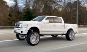 White squatted truck.